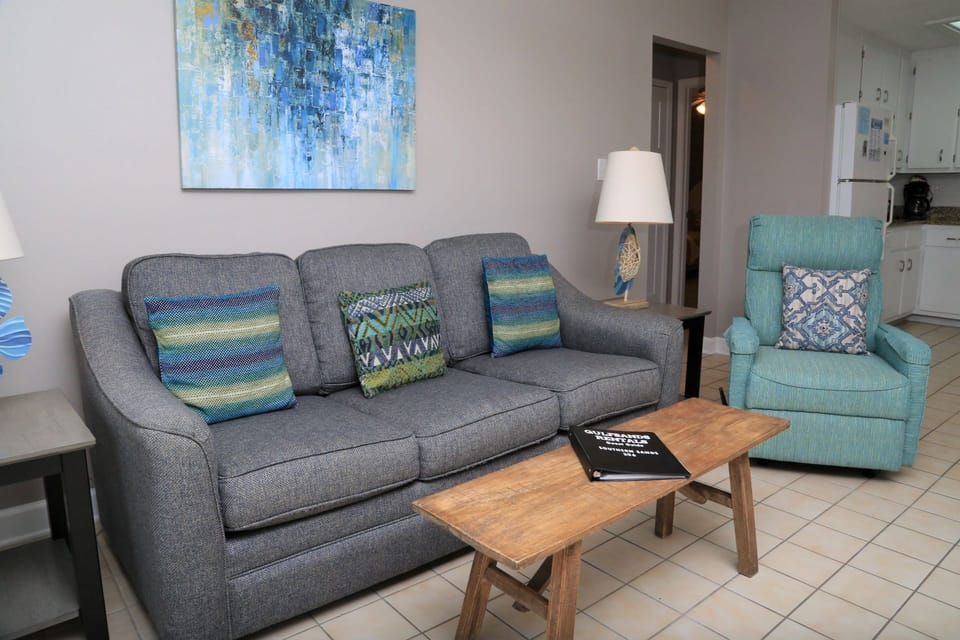 The living room with direct access to the balcony.
