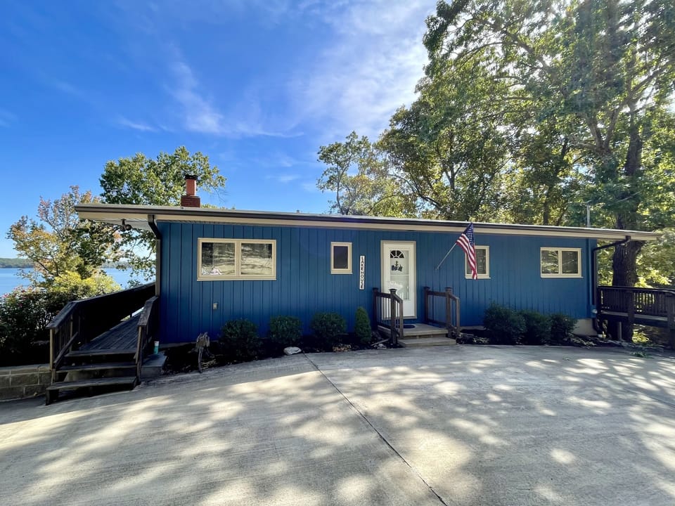 With new exterior paint, this 3 BR / 2 BA house sleeps 10 people. 