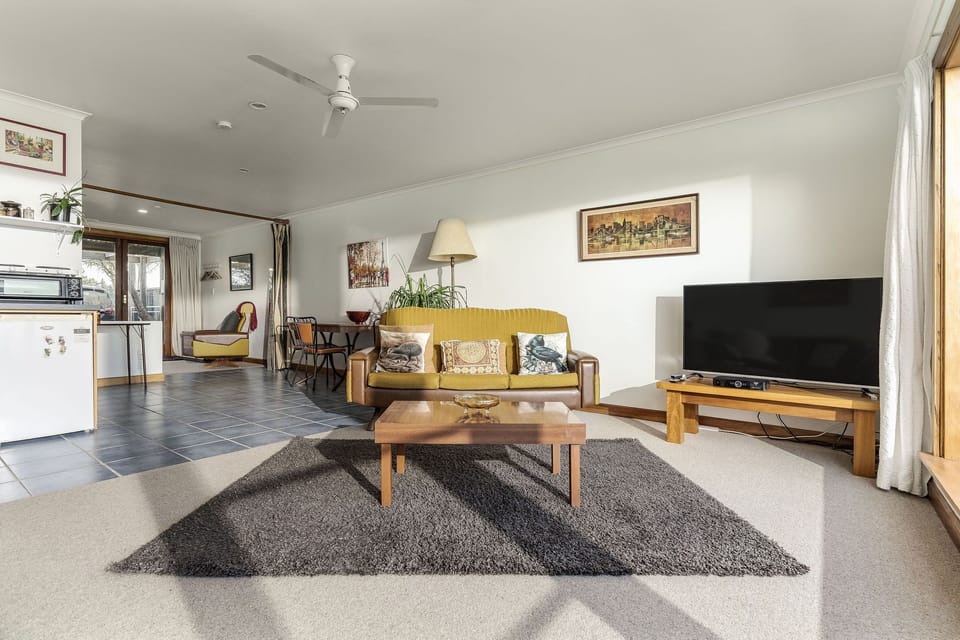 Living area with sea and mountain views