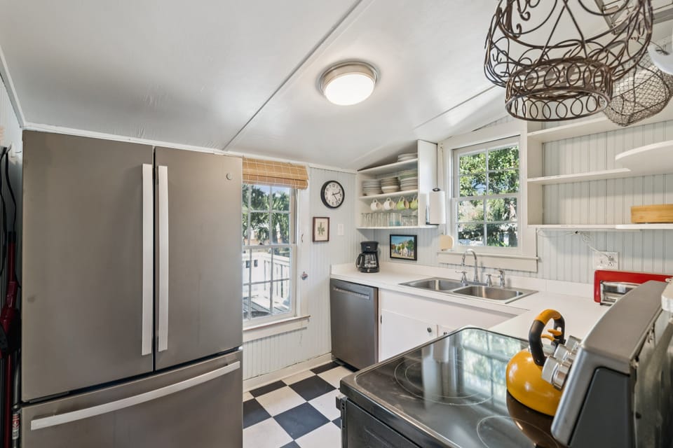 Compact convenience. Preparing beach snacks and morning coffee is a breeze in this tidy space.