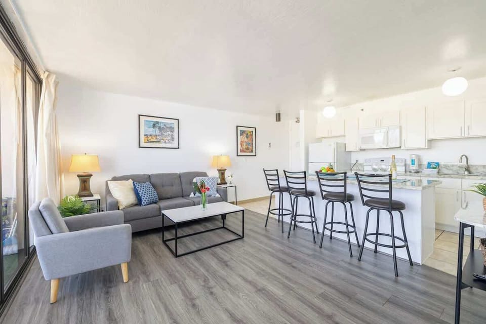 The living room features a pull-out sleeper sofa!