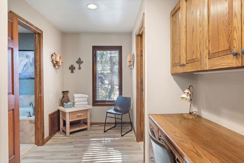 Primary bathroom and desk space
