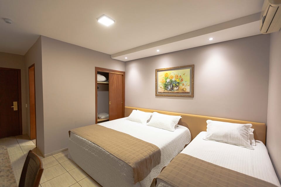Standard Triple Room | Minibar, desk, free WiFi, bed sheets