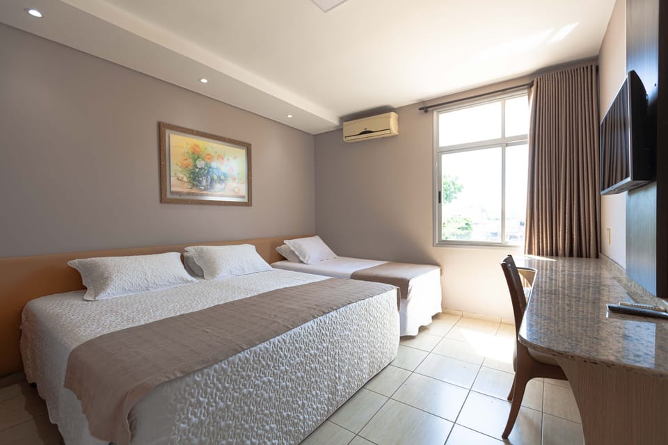 Standard Triple Room | Minibar, desk, free WiFi, bed sheets