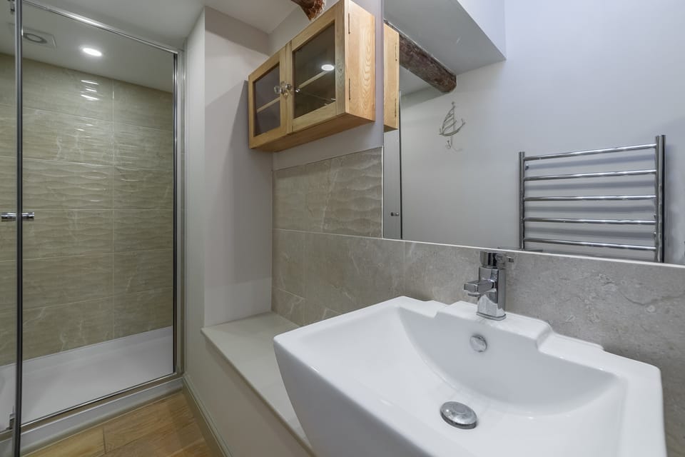 First floor: Family shower room with large walk-in shower