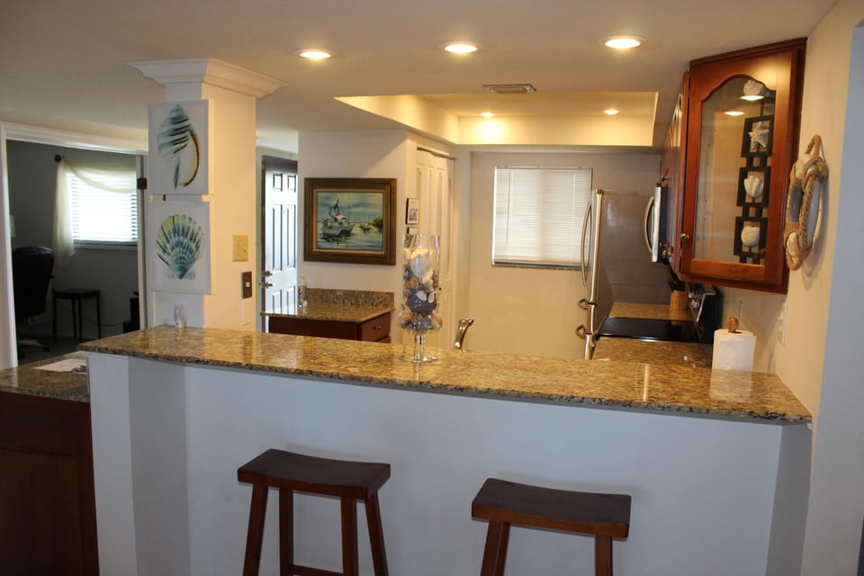 Bar with kitchen view