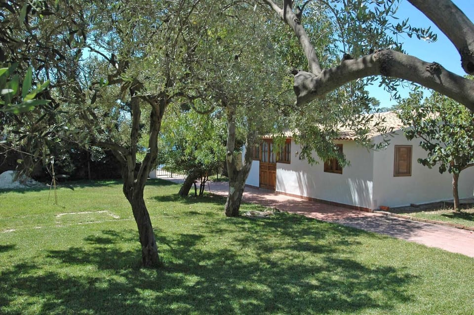 Annexe with living room, refrigerator, bathroom and bedroom.