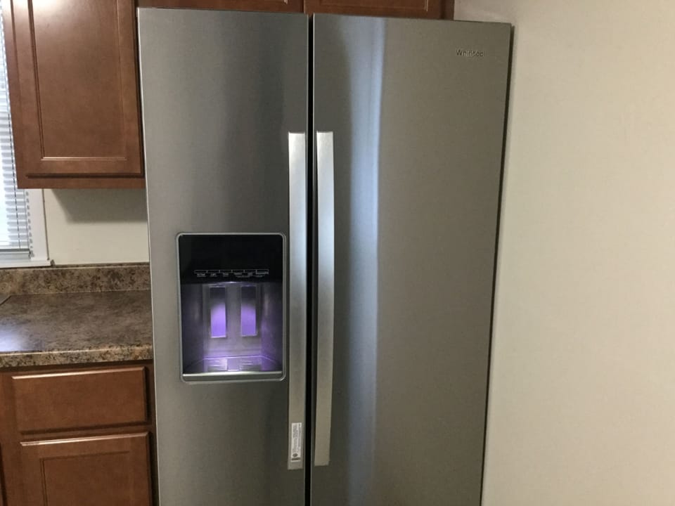 Large, family sized fridge with Front ice and water.