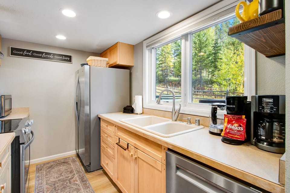 Tree / Forest views from sink window. Kitchen fully stocked, including spices. 