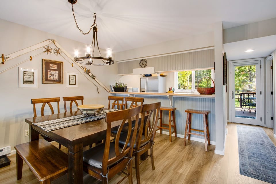 Room for all the gang to dine!  Dining table seats 8-9 plus 4 counter stools.