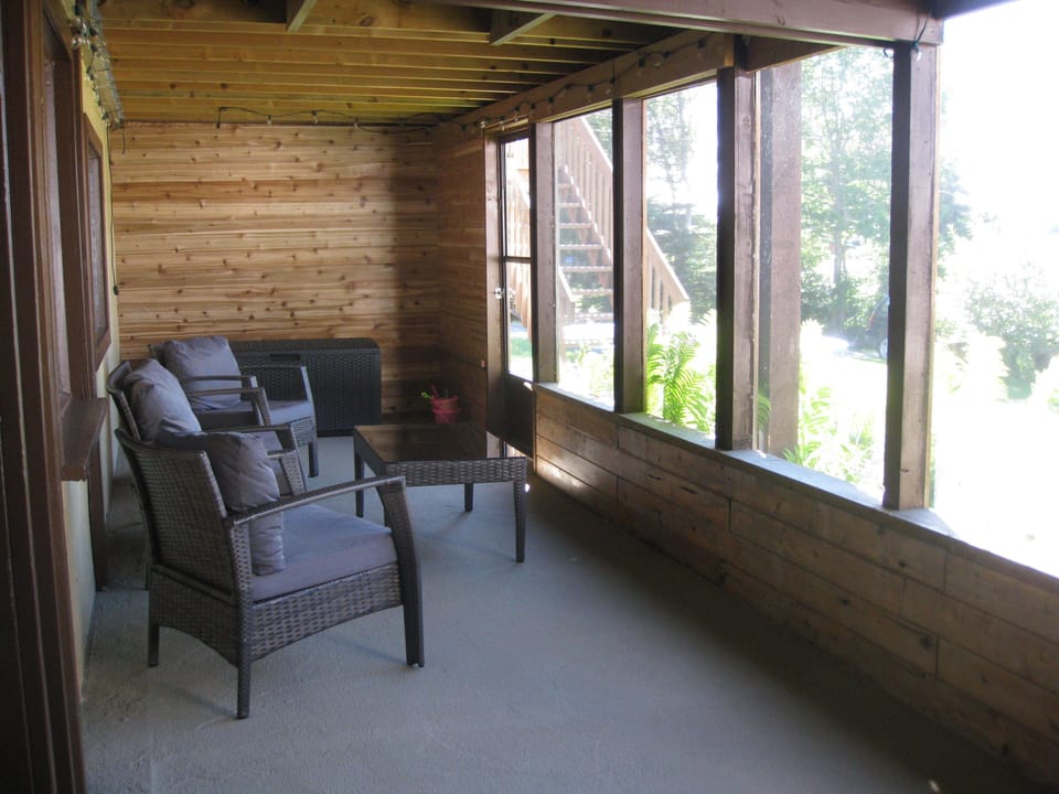Screen room off the walk out basement. A perfect place to relax!