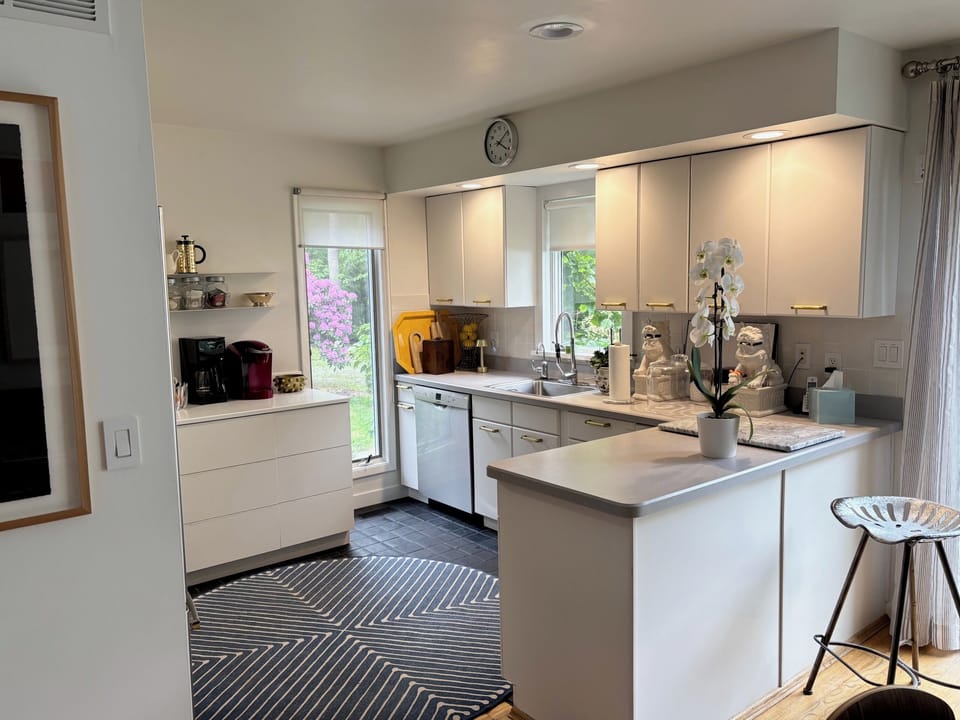 Kitchen with Coffee Counter, new stove and dishwasher.