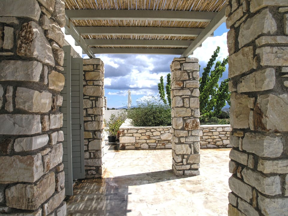 House T, Pergola with bamboo shading