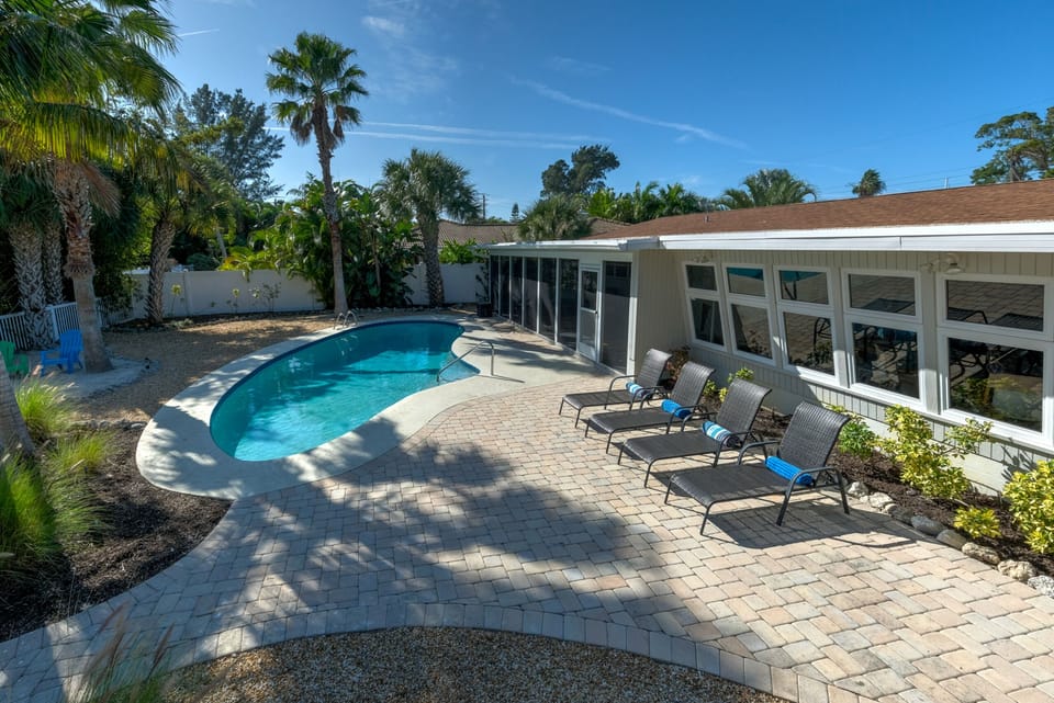 Enjoy soaking up the sun and swimming in the large pool 