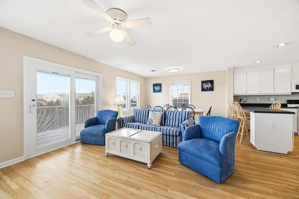 Top-Level Living Room with Deck Access