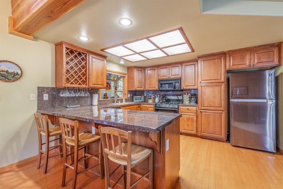Breakfast bar with granite counters.