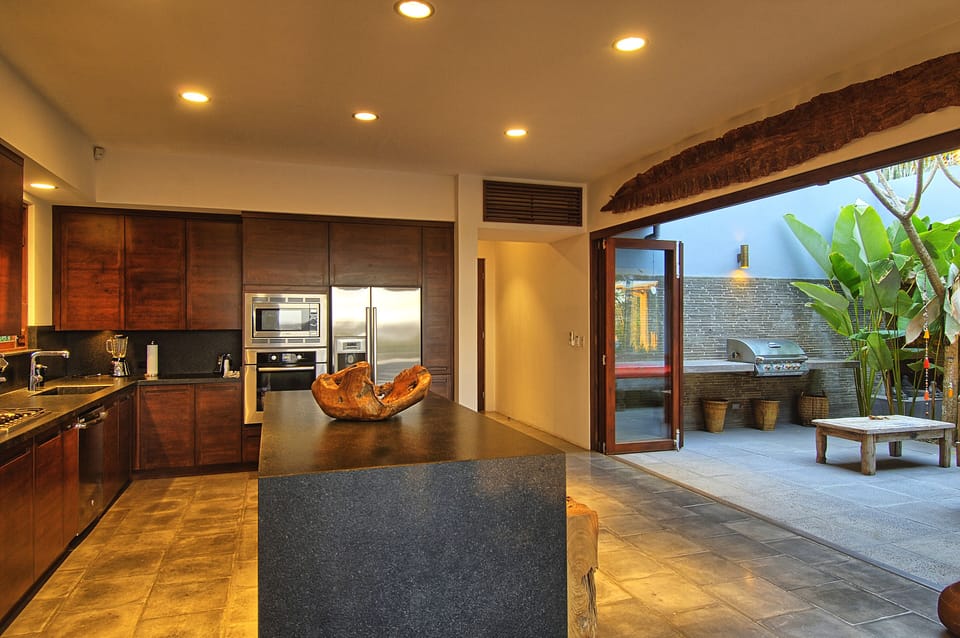 Kitchen opens to the BBQ patio