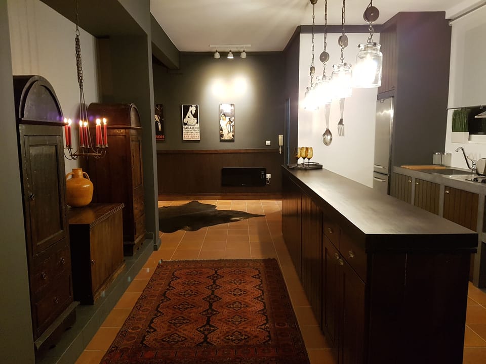 Deluxe Apartment | Living area | Flat-screen TV