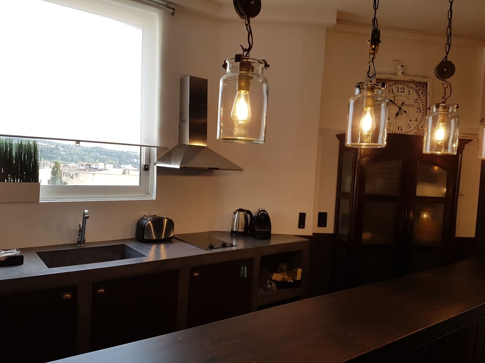 Deluxe Apartment | Living area | Flat-screen TV