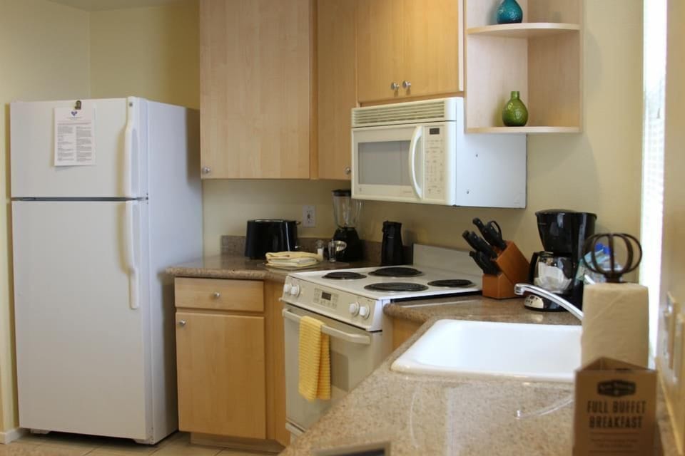 Full kitchen with everything you need to cook your own meals if you choose.