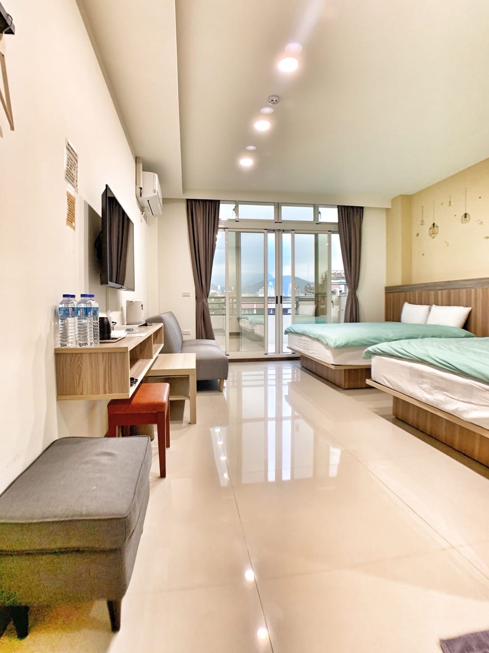 Deluxe Quadruple Room | Hypo-allergenic bedding, blackout drapes, soundproofing, free WiFi