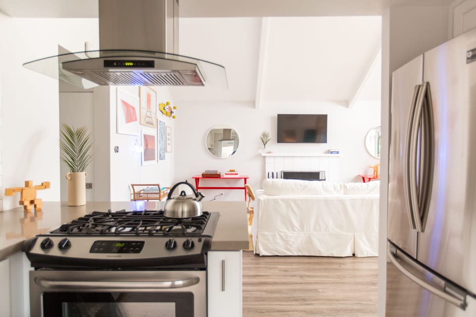 Whip up a feast in the sleek, modern kitchen.