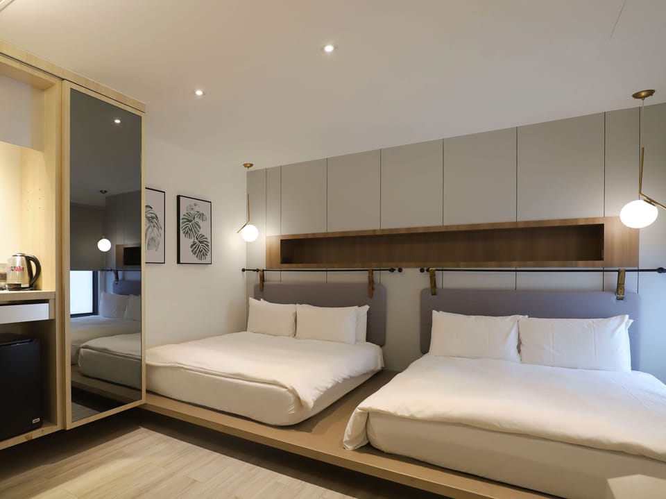 Family Quadruple Room, 2 Double Beds | Down comforters, individually furnished, desk, soundproofing