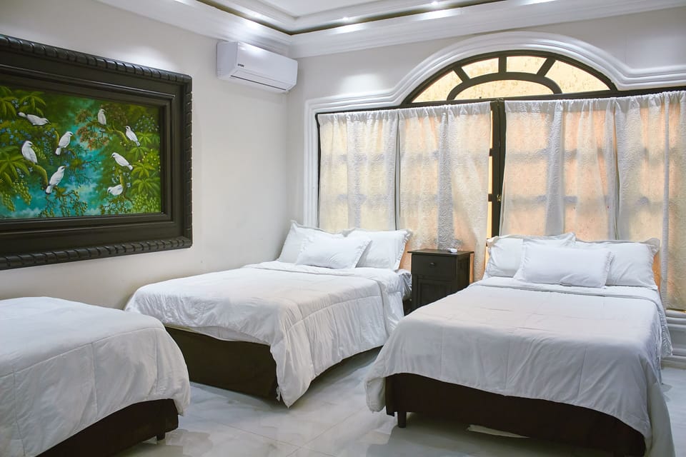 Basic Triple Room | Down comforters, iron/ironing board, individually furnished, bed sheets