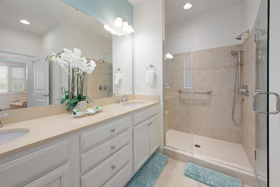 First floor master with glass shower.