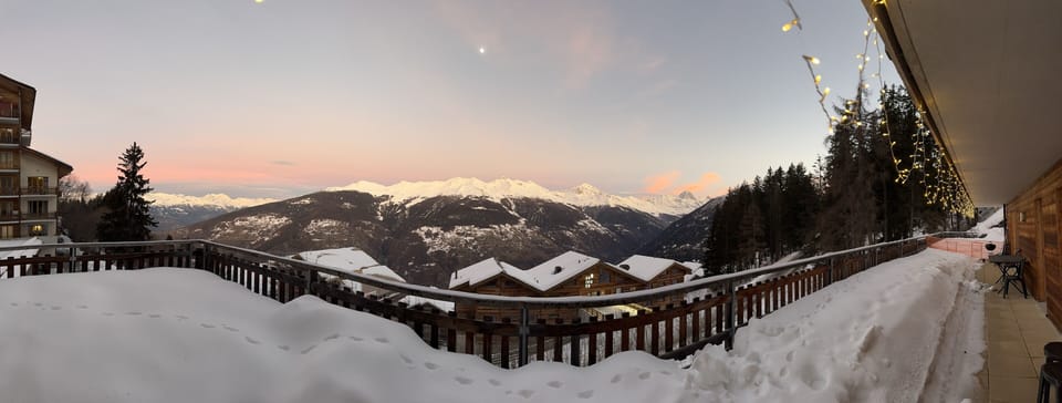 Pano from Balcony @ sunset. Eringer Spa Hotel is 50m below One Les Cimes