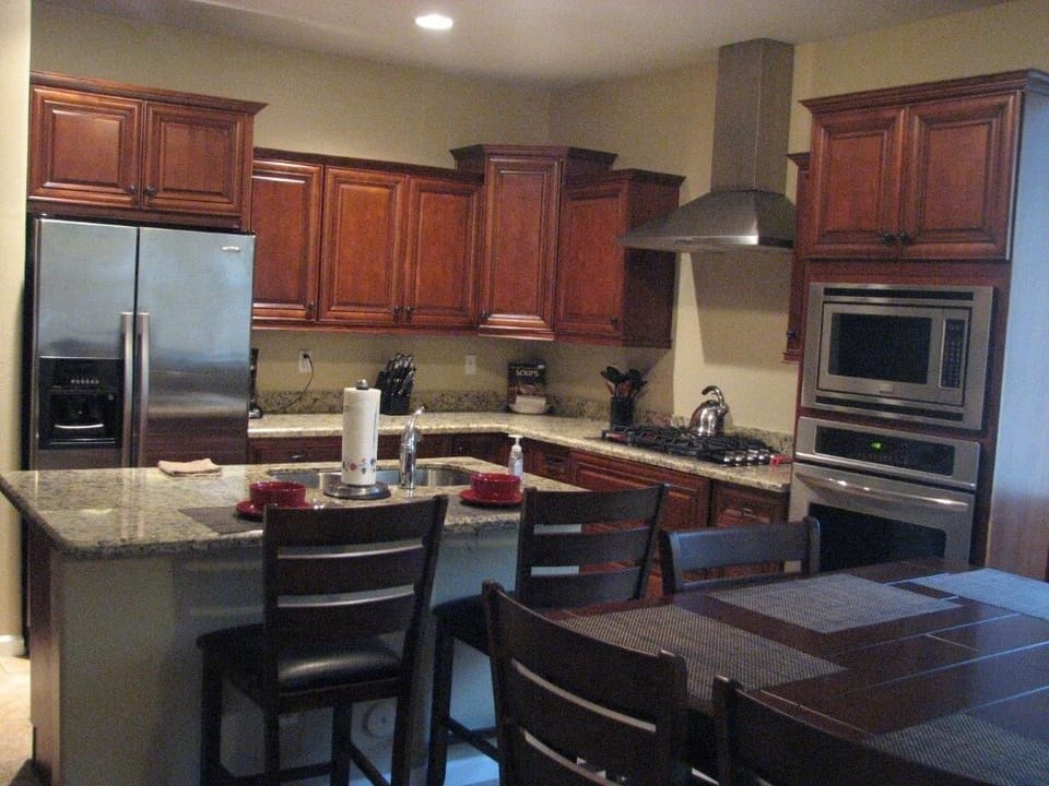 Granite countertops and stainless steel appliances
