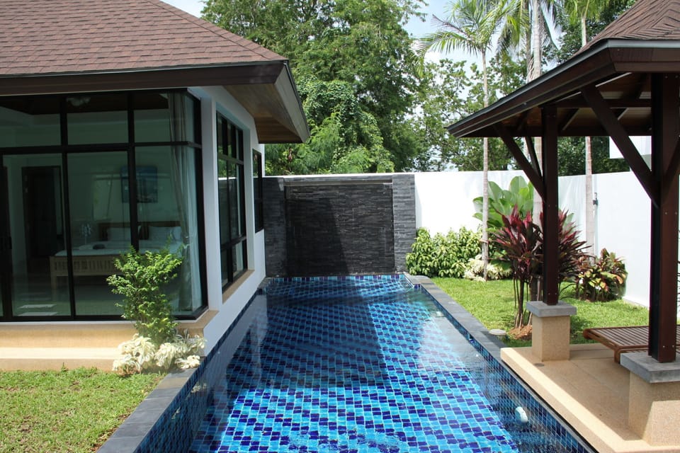 Master bedroom next to pool