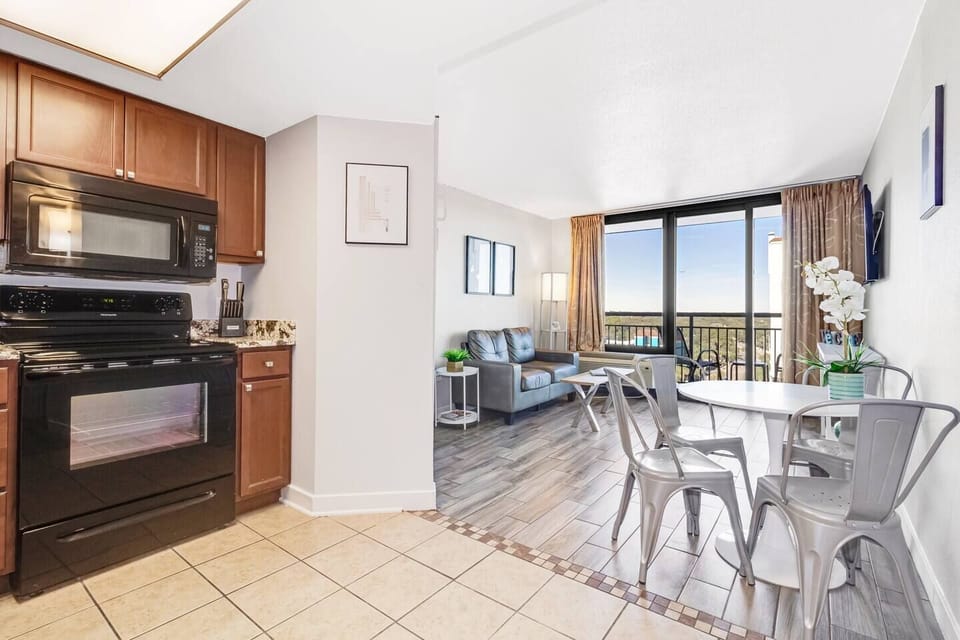 Immerse yourself in open-concept living, where the living area seamlessly transitions into the dining space, creating a spacious and welcoming environment for both relaxation and entertaining.