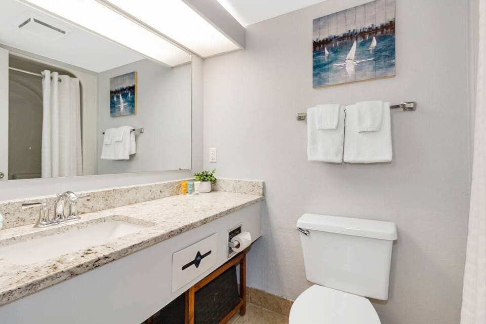 Discover modern elegance in our suite's bathroom.