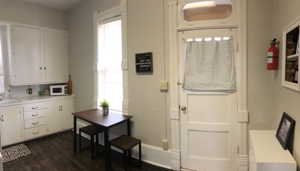 Kitchen area with smaller table.