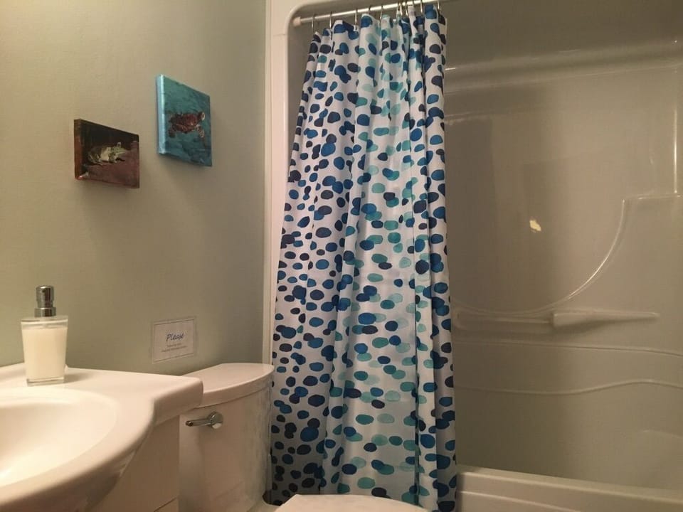 3-piece bathroom with tub and shower