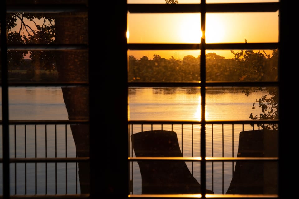 View of the lake and top deck from the livingroom window
