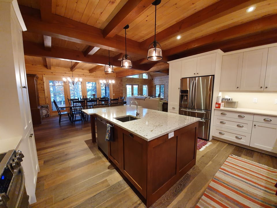 Custom kitchen. Stove. 2 Fridges, 2 dishwashers, 3 ovens (microwave, airfryer).