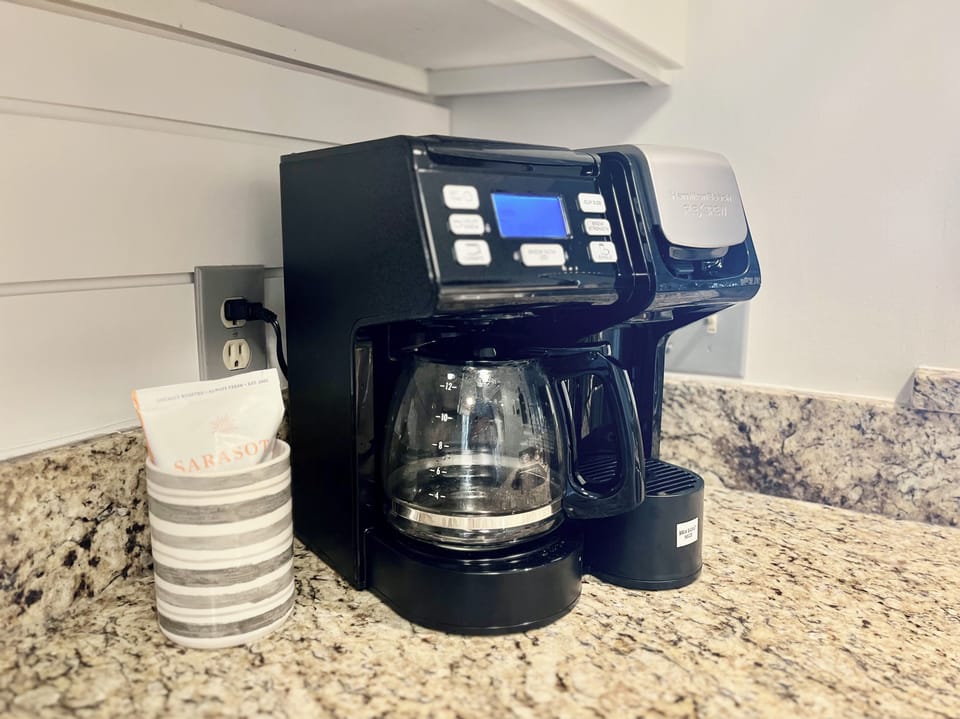 The coffee maker works with ground coffee (supplied) or K-cups, if you prefer.