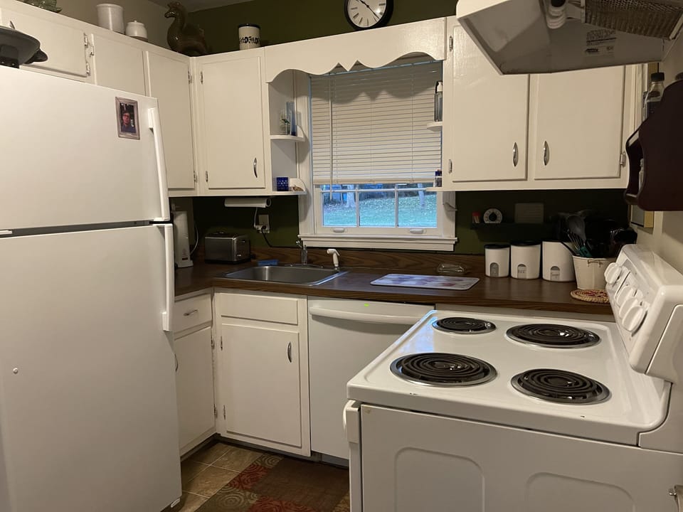 full kitchen with coffee maker and more