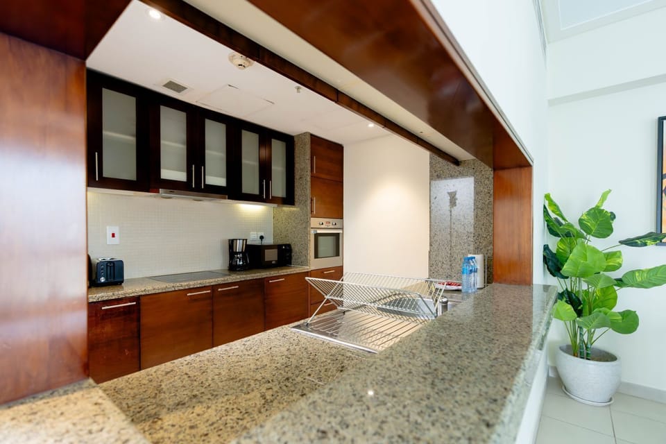 Deluxe Apartment, 2 Bedrooms, Canal View | Private kitchen | Fridge, microwave, oven, dishwasher