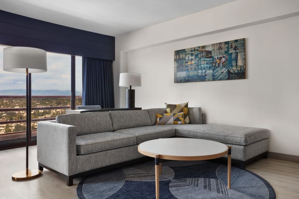 Executive Suite, 1 King Bed with Sofa bed, City View | Living room | 32-inch Smart TV with cable channels, TV