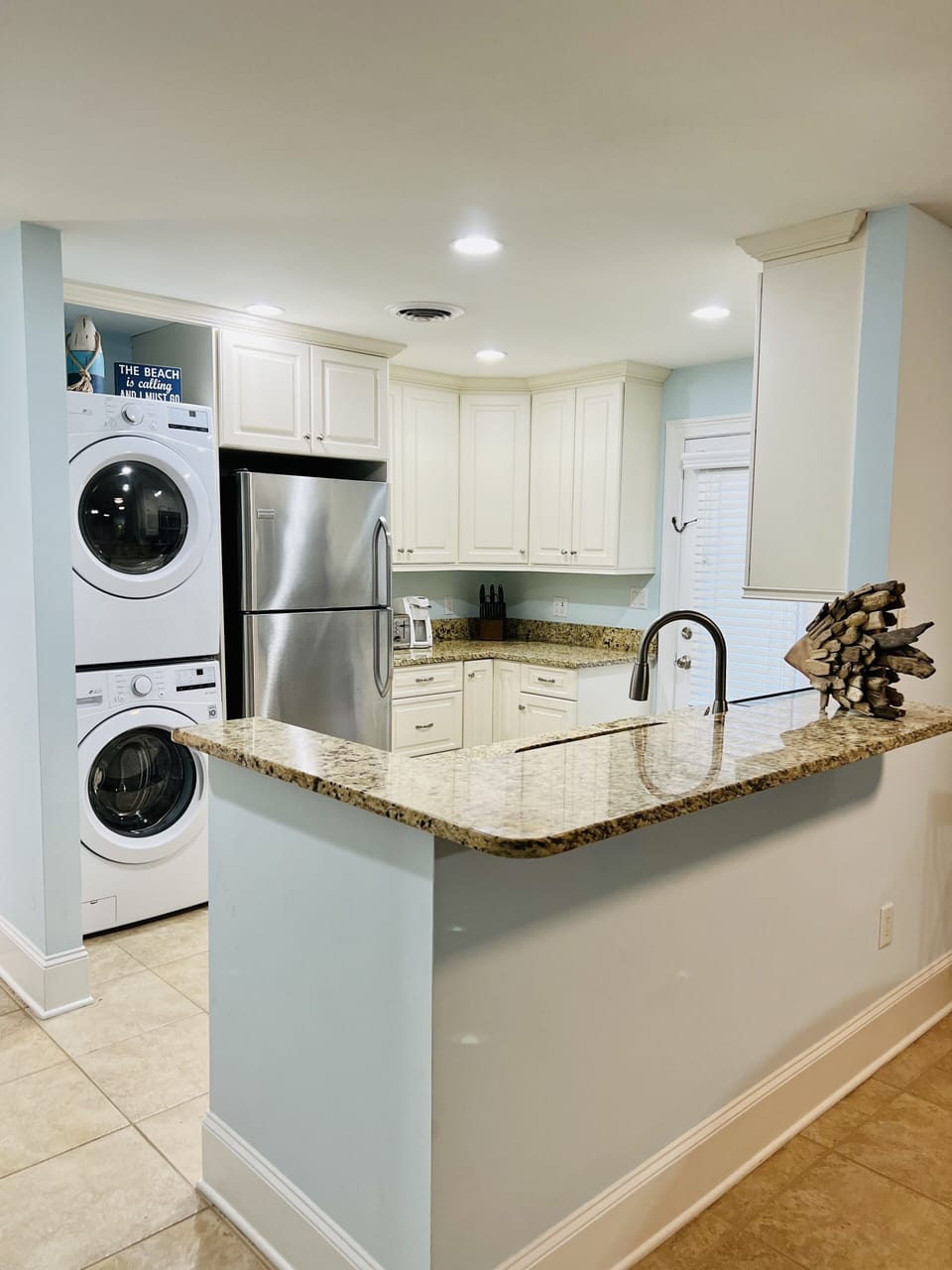 Updated kitchen with everything you will need, open to the villa. 