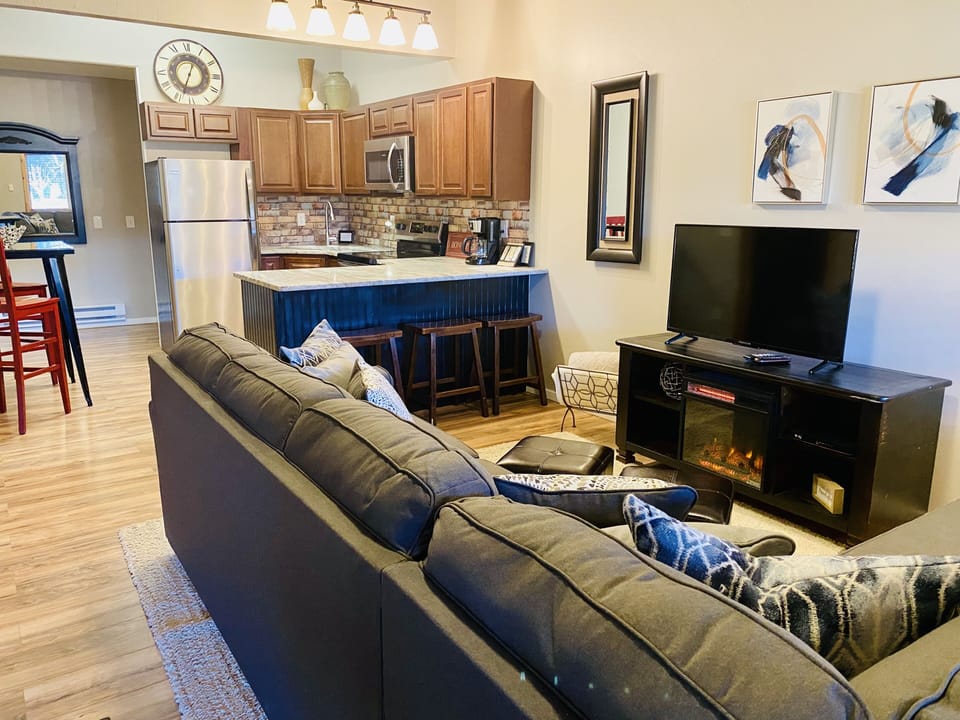 Cozy living with an electric fireplace for those cold evenings.
