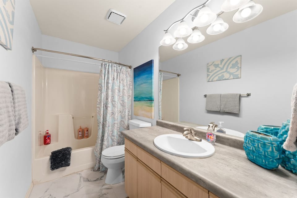 The ensuite bath adds privacy and an easy morning routine for whoever claims the king suite.