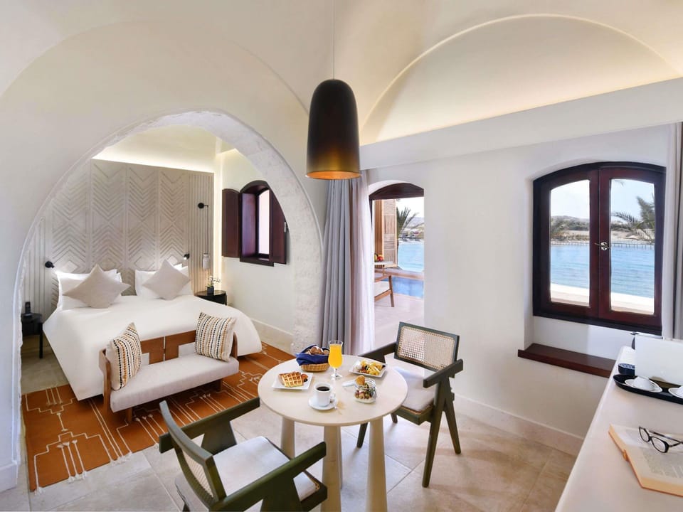 Junior Suite, 1 Queen Bed, Sea View | Hypo-allergenic bedding, minibar, in-room safe, blackout drapes