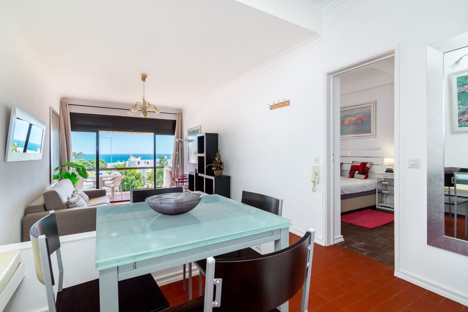 Apartment, 1 Bedroom, Balcony, Partial Sea View | In-room dining