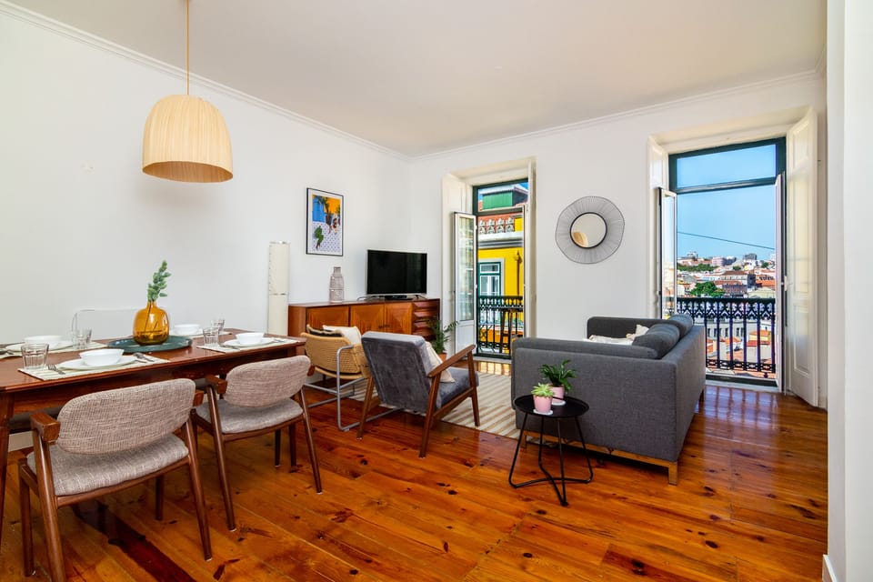 Apartment, 2 Bedrooms, Balcony, City View | Living area | Flat-screen TV