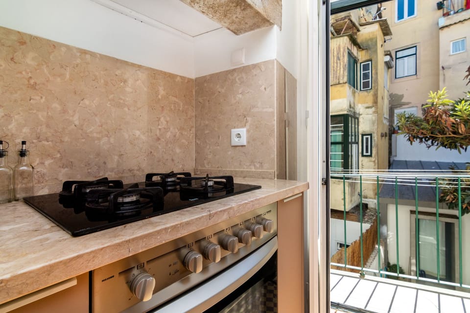 Apartment, 2 Bedrooms, Balcony, City View | Private kitchen | Full-size fridge, microwave, stovetop, coffee/tea maker
