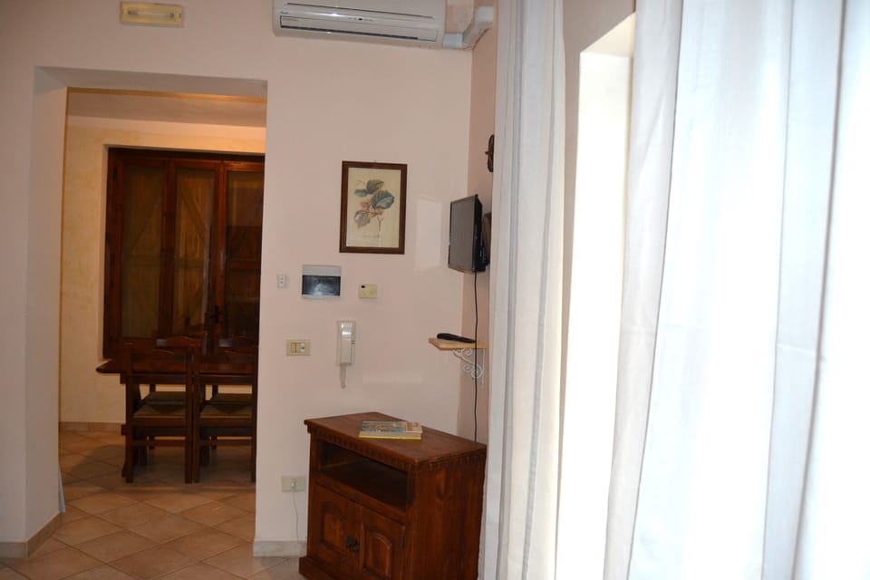 Family Apartment | Living area | Flat-screen TV